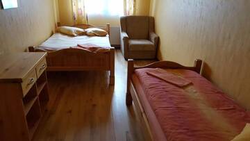 Фото номера Трехместный номер с общим туалетом Гостевой дом Apelsīns г. Čornaja 17