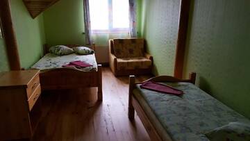 Фото номера Трехместный номер с общим туалетом Гостевой дом Apelsīns г. Čornaja 8