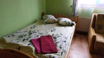 Фото номера Трехместный номер с общим туалетом Гостевой дом Apelsīns г. Čornaja 11