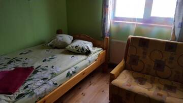 Фото номера Трехместный номер с общим туалетом Гостевой дом Apelsīns г. Čornaja 12