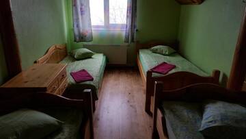 Фото номера Четырехместный номер с общей ванной комнатой Гостевой дом Apelsīns г. Čornaja 4